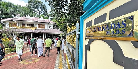 Relatives and friends throng Nampichirakalayil, the house of Dr Vandana Das at Pattalamukk in Kottayam. The nameplate ‘Dr Vandana Das MBBS’ is also seen | express