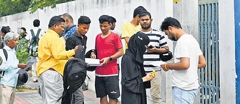 Candidates gather outside an Eamcet examination centre in Hyderabad on Wednesday | Vinay Madapu
