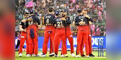 Royal Challengers Bangalore players celebrate after winning their IPL 2023 cricket match against Rajasthan Royals, at Sawai Mansingh Stadium in Jaipur. (Photo | PTI)