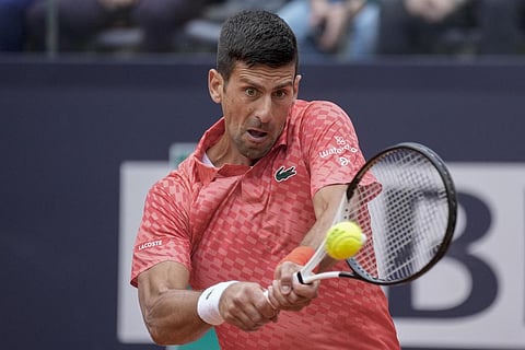 Novak Djokovic of Serbia returns the ball to Cameron Norrie of Britain at the Italian Open tennis tournament, in Rome, Tuesday, May 16, 2023. (Photo | AP)