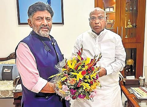 Mallikarjun Kharge with D K Shivakumar, in New Delhi on Tuesday | PTI