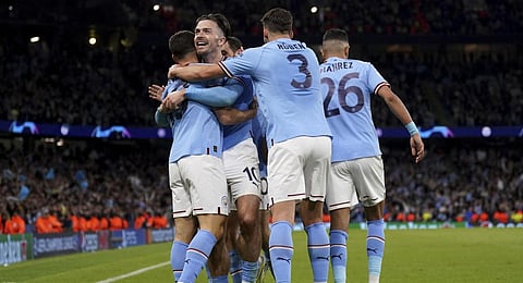 Manchester City's Jack Grealish celebrates the third goal scored by Julian Alvarez during the UEFA Champions League semi-final second leg match.(Photo | AP)