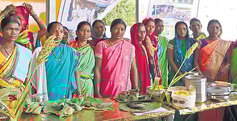 Women showcase food items at a tribal food festival organised at Utnoor on Saturday.