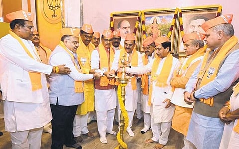 Chief Minister Shivraj Singh Chouhan joins state BJP leaders to light traditional lamp before the state party executive meeting in Bhopal on Friday | EXPRESS