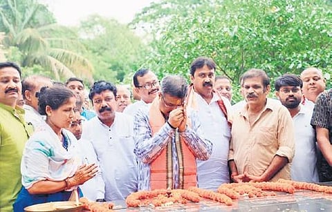 Union Minister Dharmendra Pradhan paying tributes to freedom fighter Malati Devi Choudhury in Angul on Sunday | Express