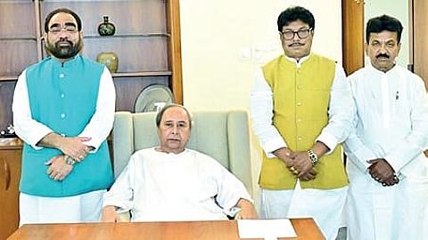 New ministers with CM at Naveen Niwas | Express