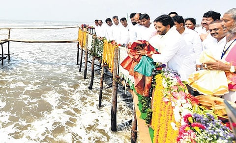 CM YS Jagan Mohan Reddy performing puja during the inauguration of construction works of Machilipatnam port on Monday. (Photo | Express)