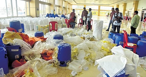 Officials of the Narcotics Control Bureau engaged in the recovery procedure of the seized methamphetamine in Kochi on Sunday | A Sanesh