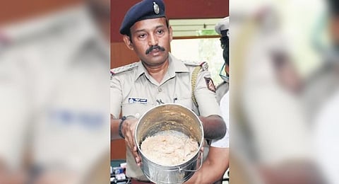Police display ambergris which was seized, at a press meet in Mysuru on Tuesday | Express