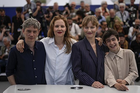 Swann Arlaud, from left, director Justine Triet, Sandra Huller and Milo Machado Graner at the photo call for the film 'Anatomy of a Fall' at the 76th international film festival, Cannes. (Photo | AP)