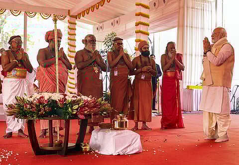 Prime Minister Narendra Modi greets high priests of various 'adheenams' in Tamil Nadu at the inauguration of the new Parliament building, in New Delhi, Sunday, May 28, 2023. (Photo | PTI)