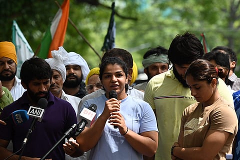 Protesting wrestlers Bajrang Punia, Vinesh Phogat and Sakshi Malik during a press conference, at Jantar Mantar in New Delhi, Sunday May 28, 2023. (Photo | Parveen Negi/ Express)