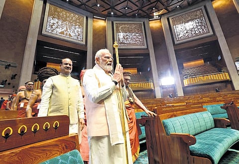 Prime Minister Narendra Modi installs the ‘Sengol’ at the new Parliament building (Photo | PIB)