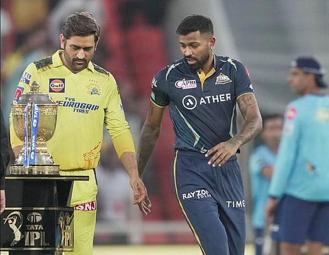 Chennai Super Kings captain Mahendra Singh Dhoni and Gujarat Titans captain Hardik Pandya at their IPL 2023 cricket match between Gujarat Titans and Chennai Super Kings. (Photo | PTI)