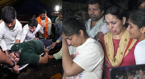 Protesting wrestlers broke down on Wednesday night after they were reportedly assaulted by Delhi Police personnel. (Photos | PTI)