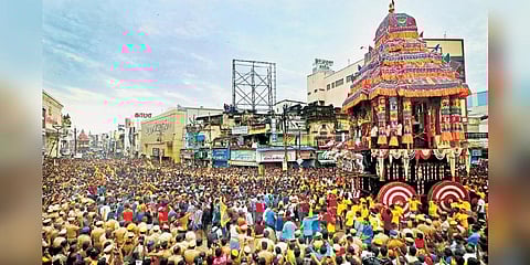 Devotees are seen pulling the massive car on Wednesday in Masi street during the Chithirai car festival of Madurai Meenakshi Sundereswarar Temple | KK SUNDAR