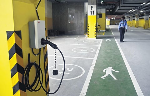 An EV charging point at the Chennai airport | Express