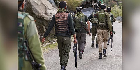Security personnel near the site of an encounter with terrorists in Kandi area of Rajouri district, Saturday, May 6, 2023. (Photo | PTI)