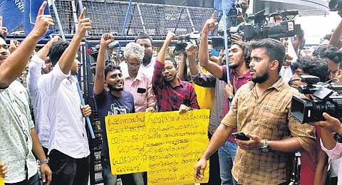 Members of Fraternity Movement protest in front of Shenoy’s theatre in Kochi