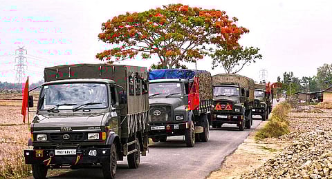 Army and Assam Rifles personnel conduct a flag march in violence-hit areas in Manipur.(Photo | PTI)