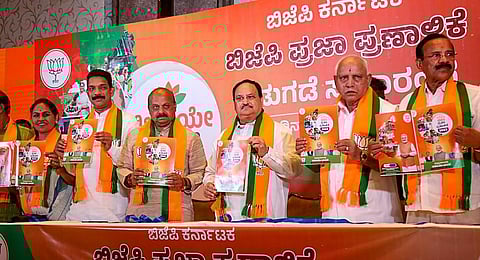 BJP leaders releases the party's manifesto for the upcoming Karnataka Assembly elections.(File Photo | PTI)
