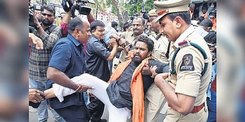 Police take Bajrang Dal activists into custody in Hyderabad on Friday | Vinay Madapu