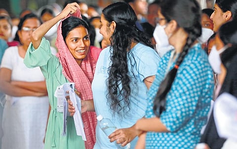 Students have a discussion after appearing for the NEET-UG examination 2023 at Saraswathi Vidyanikethan School in Kochi on Sunday | T P Sooraj