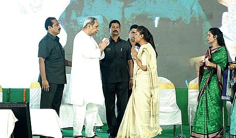 BJD candidate Deepali Das greets Chief Minister Naveen Patnaik during campaigning in Jharsuguda on Sunday | Express