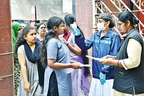 Students undergoing security check before appearing for NEET I prasant madugula