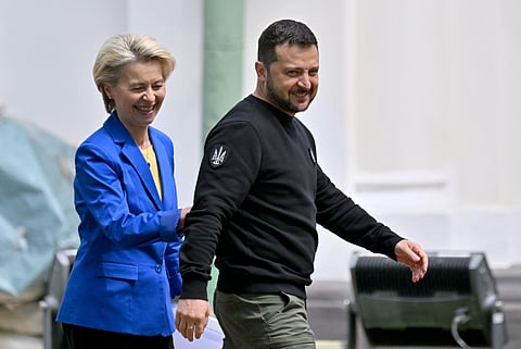 Ukrainian President Volodymyr Zelensky (R) and President of the European Commission Ursula von der Leyen (L) leave after a press conference in Kyiv on May 9, 2023. ( Photo | AFP )
