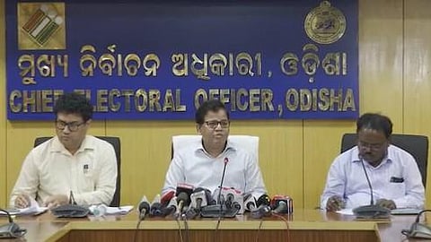 Chief electoral officer (CEO) Nikunja Bihari Dhal (Center)