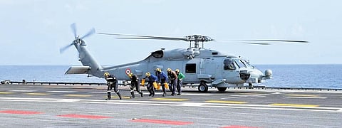 An advanced MH-60R helicopter landing on the flight deck of INS Vikrant, India’s first indigenous aircraft carrier, off Kochi coast on Wednesday. The helicopter has been procured by Indian Navy from U