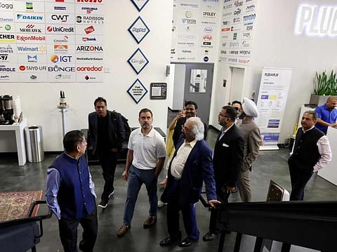 Congress leader Rahul Gandhi with Indian Overseas Congress Chairman Sam Pitroda and others arrive for a interactive session with Silicon Valley-based startup entrepreneurs. (Photo | PTI)