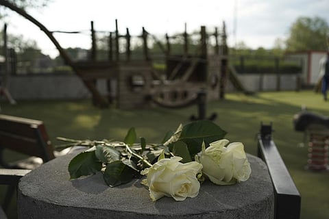 Roses lay at the playground after a knife attack Thursday, June 8, 2023 in Annecy, French Alps. (Photo | AP)