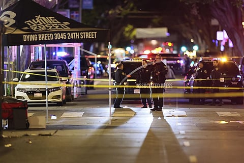 Police secure and investigate the scene of a shooting in San Francisco. (Photo | AP)