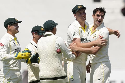 Australian skipper Pat Cummings celebrates with his teammates during the World Test Championship final against India at the Oval in London. (Photo | AP)