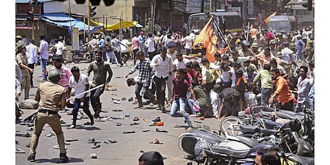 Security personnel disperse people protesting in Kolhapur district used for representation. (Photo | PTI)