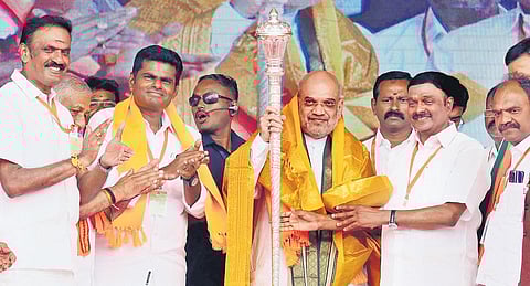 BJP leader and Union Home Minister Amit Shah being honoured at a party public meeting at Vellore on Sunday | S dinesh