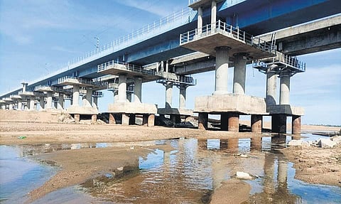 Activist Raja (inset) claims soil has been scooped out beyond the permitted depth in Thiruvennainallur | Express