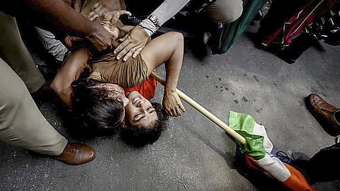Representational Image: Security personnel detain wrestlers Vinesh Phogat and Sangeeta Phogat during the wrestlers' protest march towards the new Parliament building, in New Delhi.