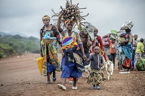 FILE - Residents flee fighting between M23 rebels and Congolese forces near Kibumba, some 20 km North of Goma, Democratic republic of Congo, Oct. 29, 2022. (Photo | AP)