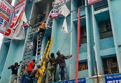 New Delhi: Students being rescued after a fire broke out at a coaching institute, at Mukherjee Nagar area in New Delhi, June 15, 2023. (Photo | PTI)