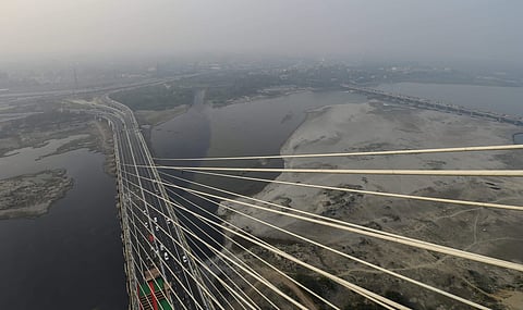 An aerial view of the iconic Signature Bridge over the Yamuna River in New Delhi.