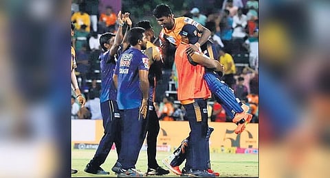 G Ajitesh (right) celebrates with Nellai players after victory | S Senbagapandiany