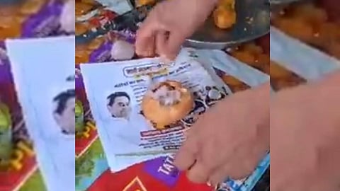 Filled out Naari Samman Yojana forms used to serve snacks. (Photo | Videograb)