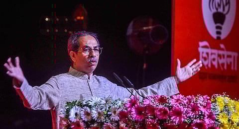 Shiv Sena (UBT) chief Uddhav Thackeray addresses the statewide office bearers camp at Worli, in Mumbai.(Photo | PTI)