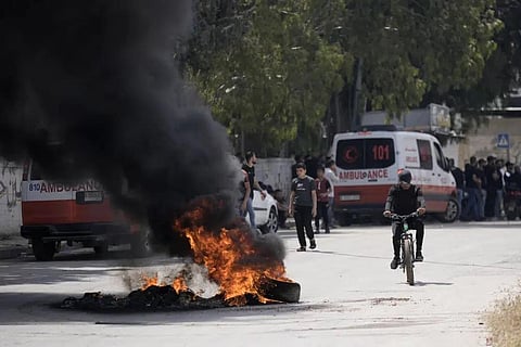 Tires burn surging clashes between Israeli forces and Palestinian militants in the West Bank city of Jenin Monday, June 19, 2023. (Photo | AP)