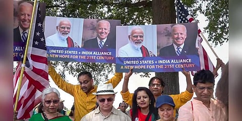Indian-Americans raise slogans to send a message of welcome to Prime Minister Narendra Modi ahead of his state visit, in Washington, Sunday, June 18, 2023. (Photo | PTI)