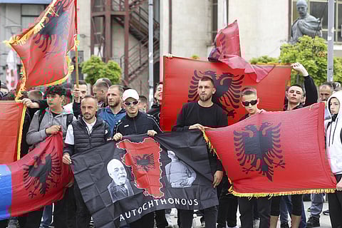 Ethnic Albanians take part in a protest in the southern, ethnic Albanian-dominated part of Mitrovica, Kosovo. (Photo | AP)