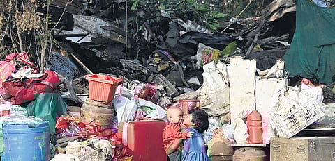 IN ALL INNOCENCE: Two kids in playful mood unwared of the ruins caused by demolition of shanties on Thursday | Shekhar Yadav